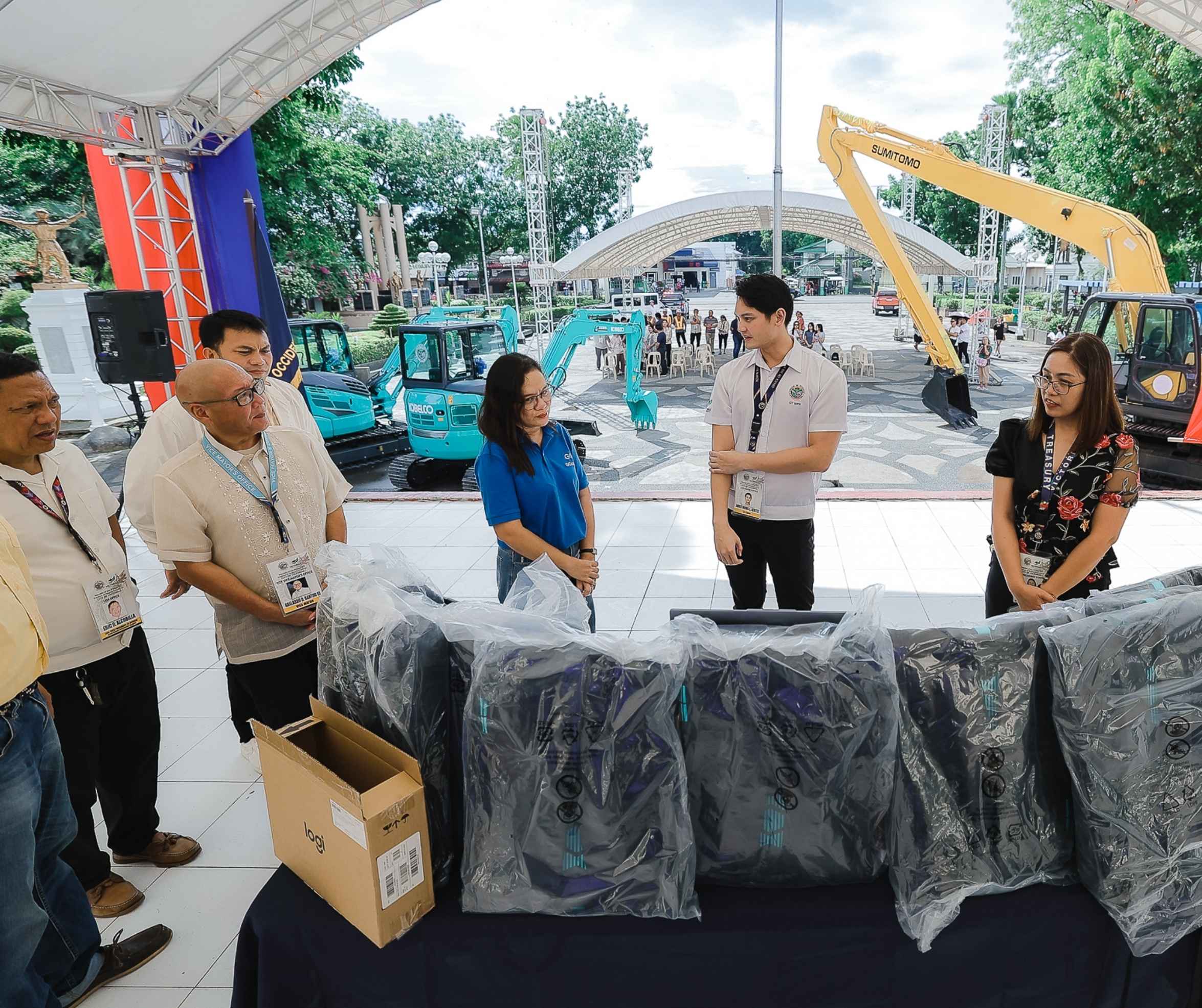 VICTORIAS CITY GETS 10 LAPTOPS FROM GCASH, TURNS OVER 3 EXCAVATORS FOR DISASTER RESPONSE